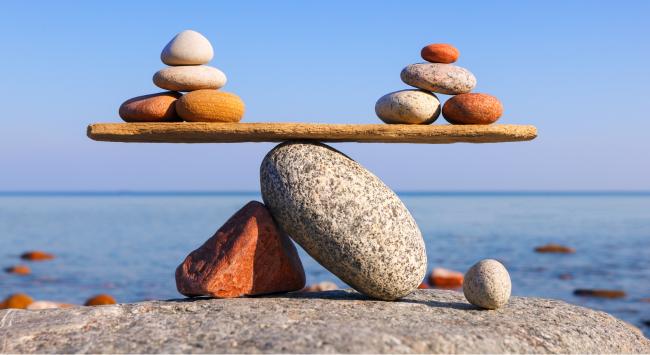 rocks on balancing scale